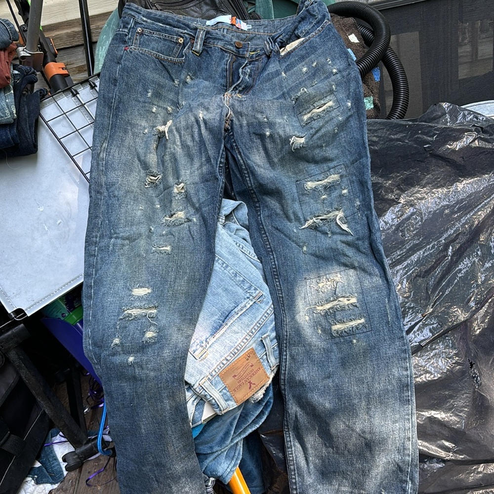 Indigo Relaxed Blue Jeans with Distressed Detailing